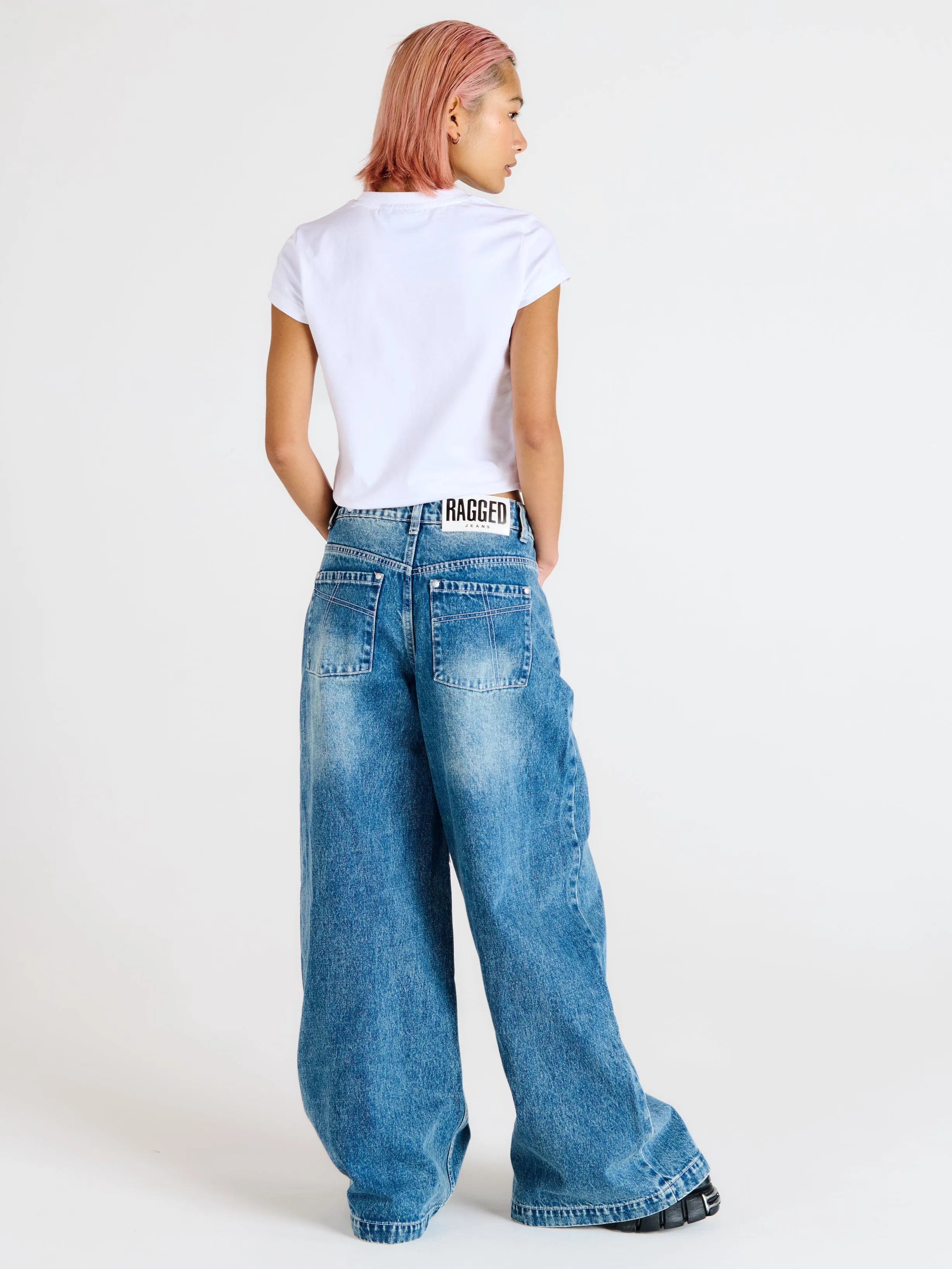 Slim-Fit Sweeper Jeans in Blue