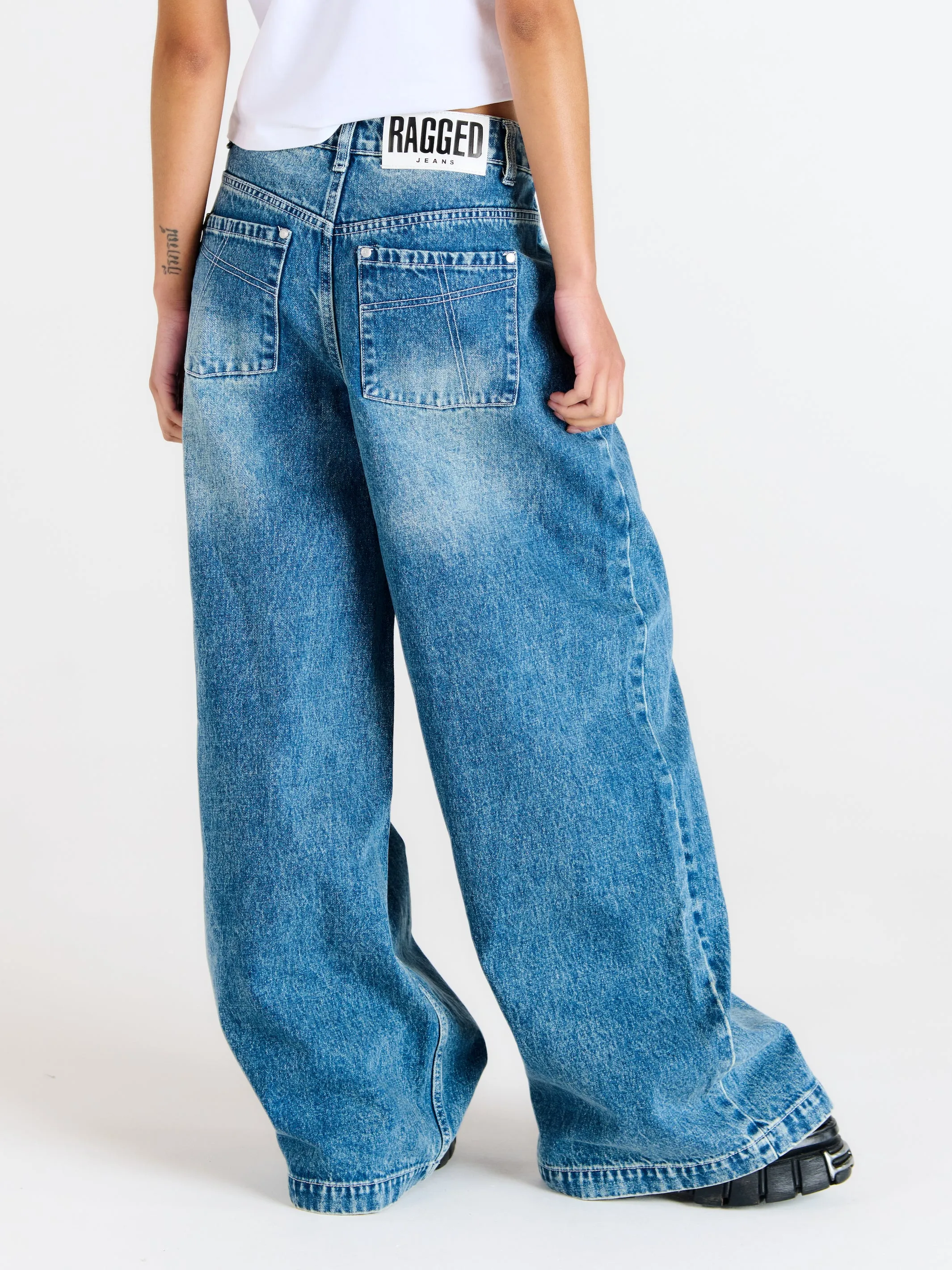 Slim-Fit Sweeper Jeans in Blue